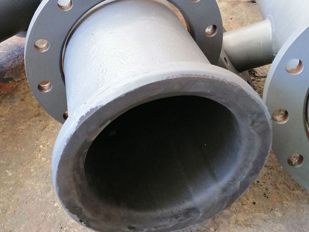 Rubber lined short pipe