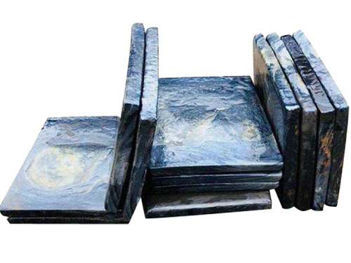 Calendered microcrystalline cast stone liners