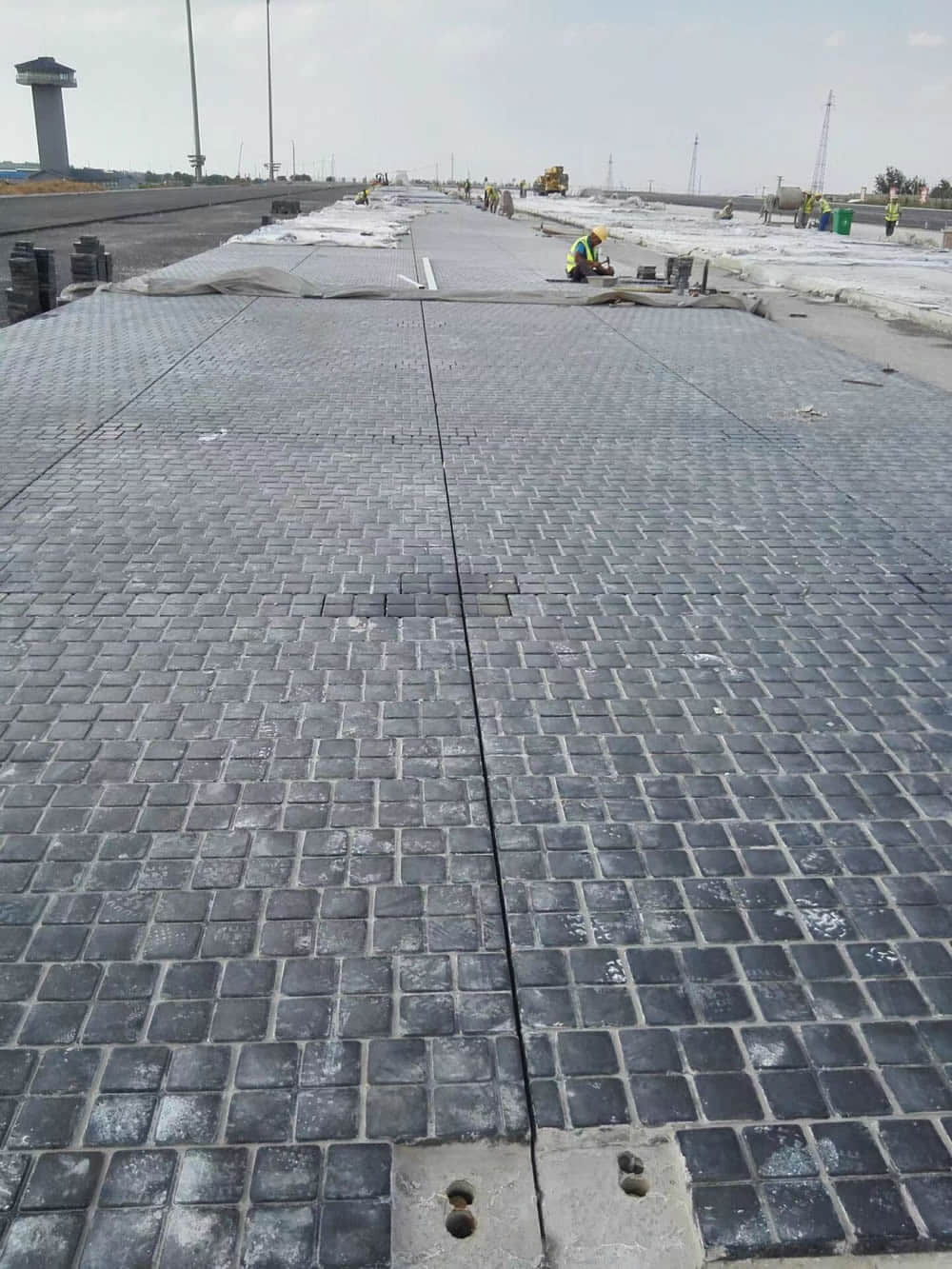 Cast bastle tiles construction site