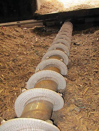 Ceramic lining for a screw conveyor