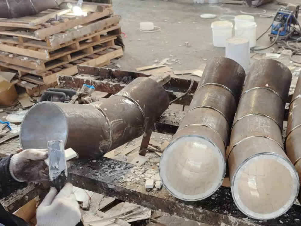 Process of ceramic tile lined pipe