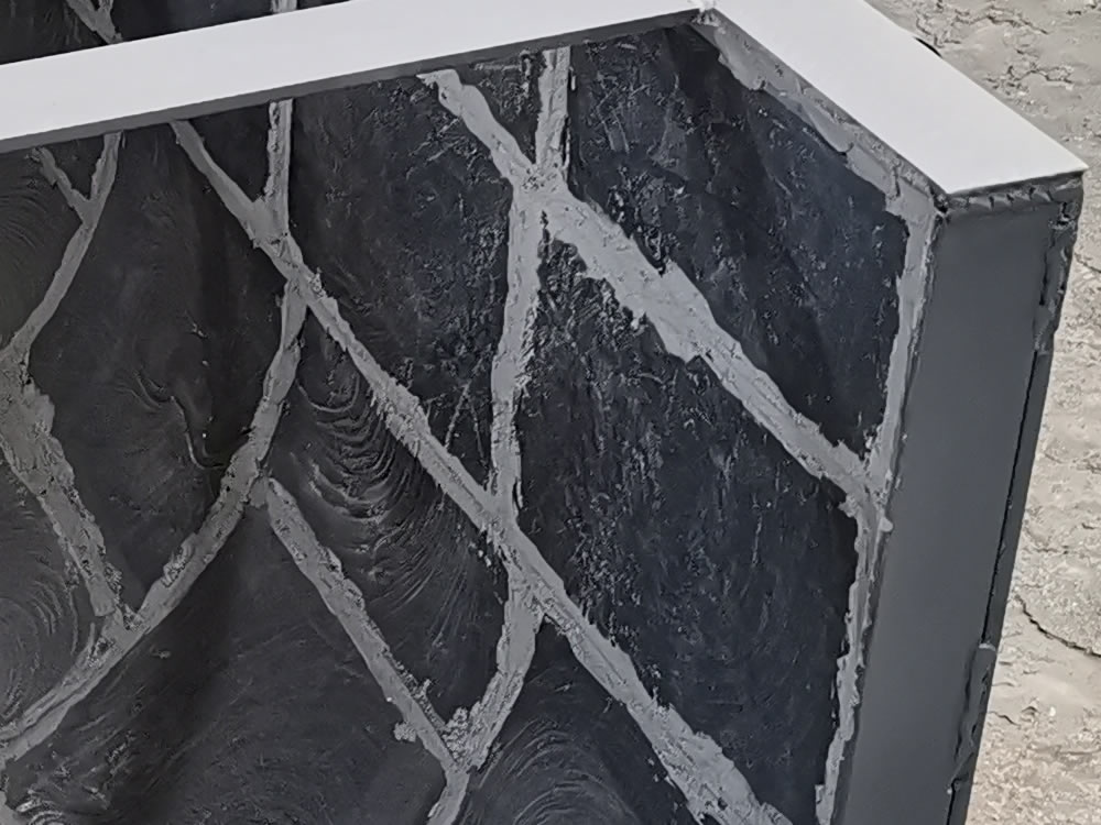 Steel-lined composite cast basalt chute